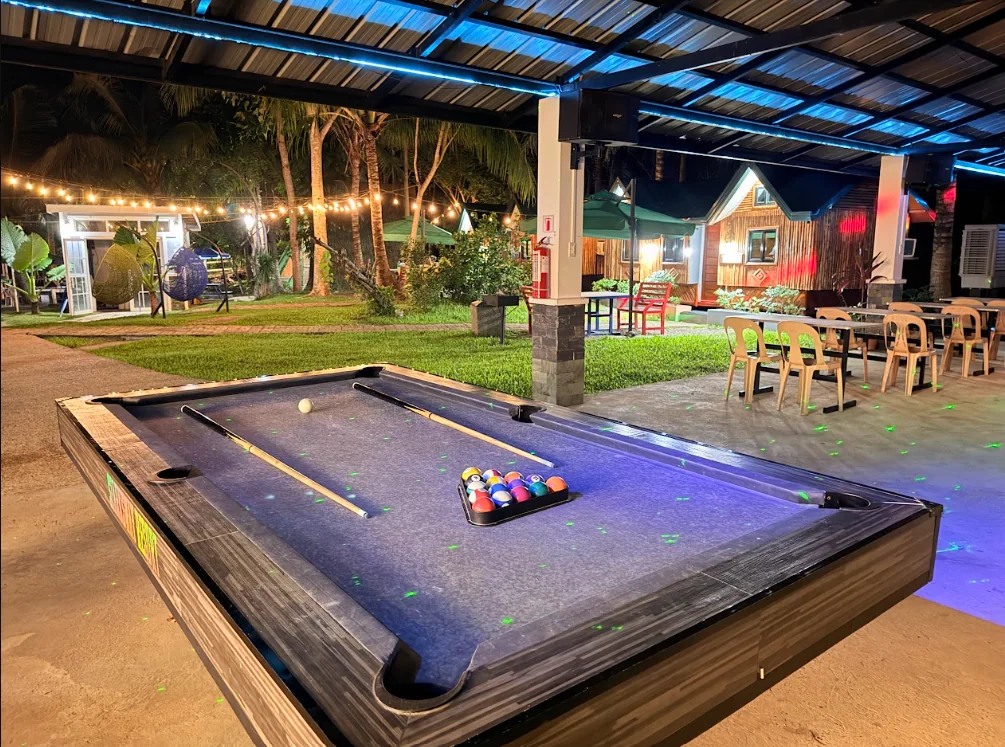 Billiards area and garden lights at Starksway Resort