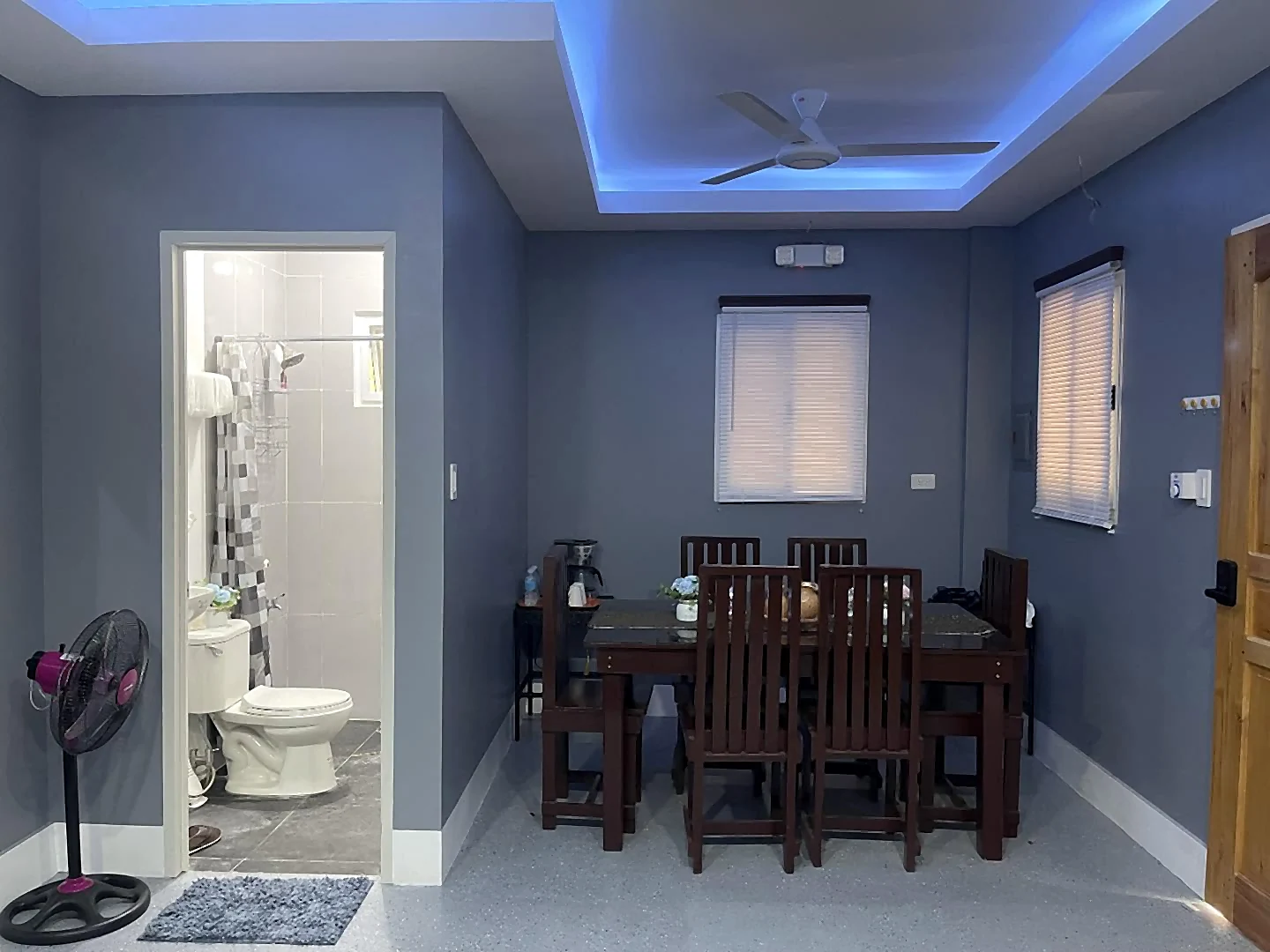 Dining and bathroom area inside a Starksway accommodation